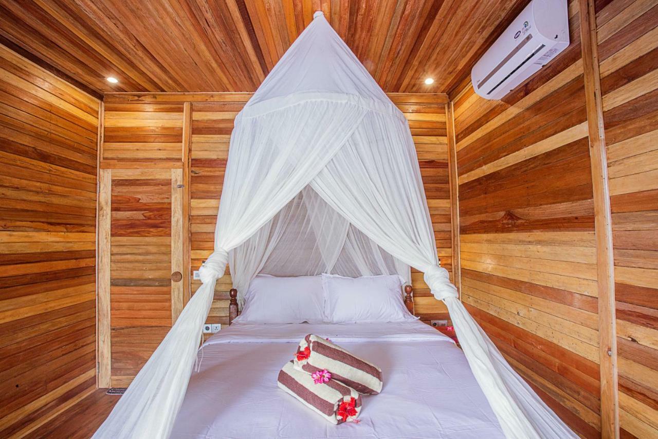 Wooden Beach Sunset Cottages نوسا ليمبونغان المظهر الخارجي الصورة